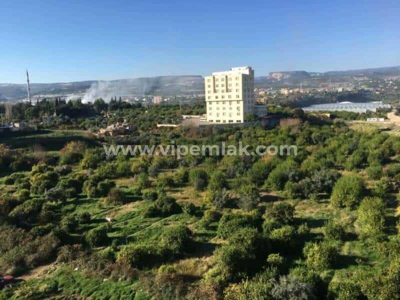 erdemli çevre yolu önden inşaatta satılık daire
