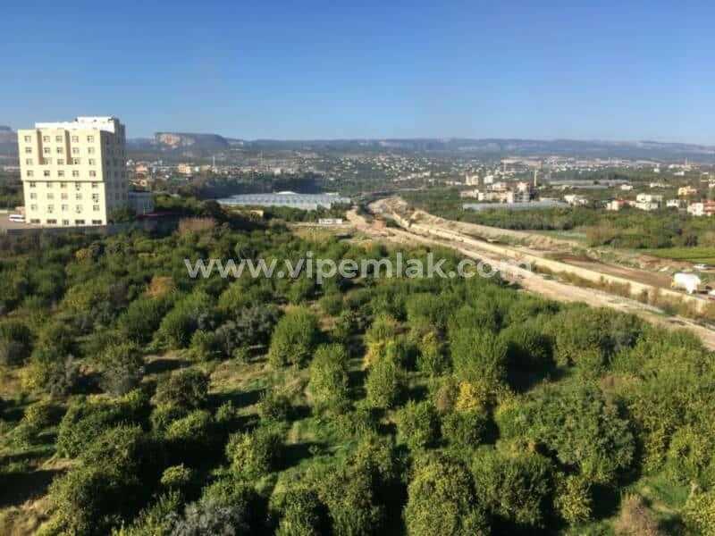 erdemli çevre yolu önden inşaatta satılık daire