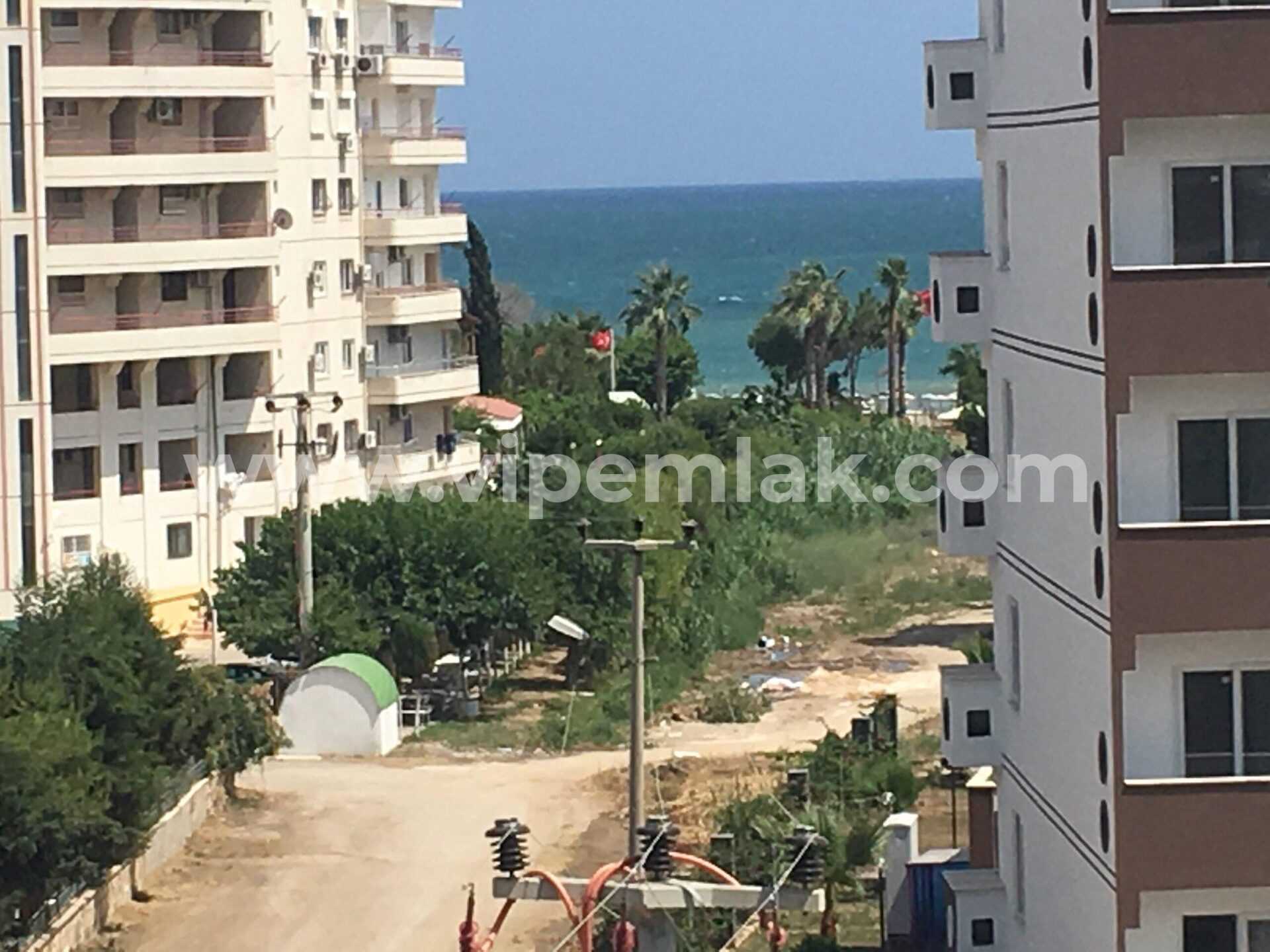 ERDEMLİ ARPAÇBAHŞİŞ BELDEKUM SİTESİNDE SATILIK YAZLIK DAİRE