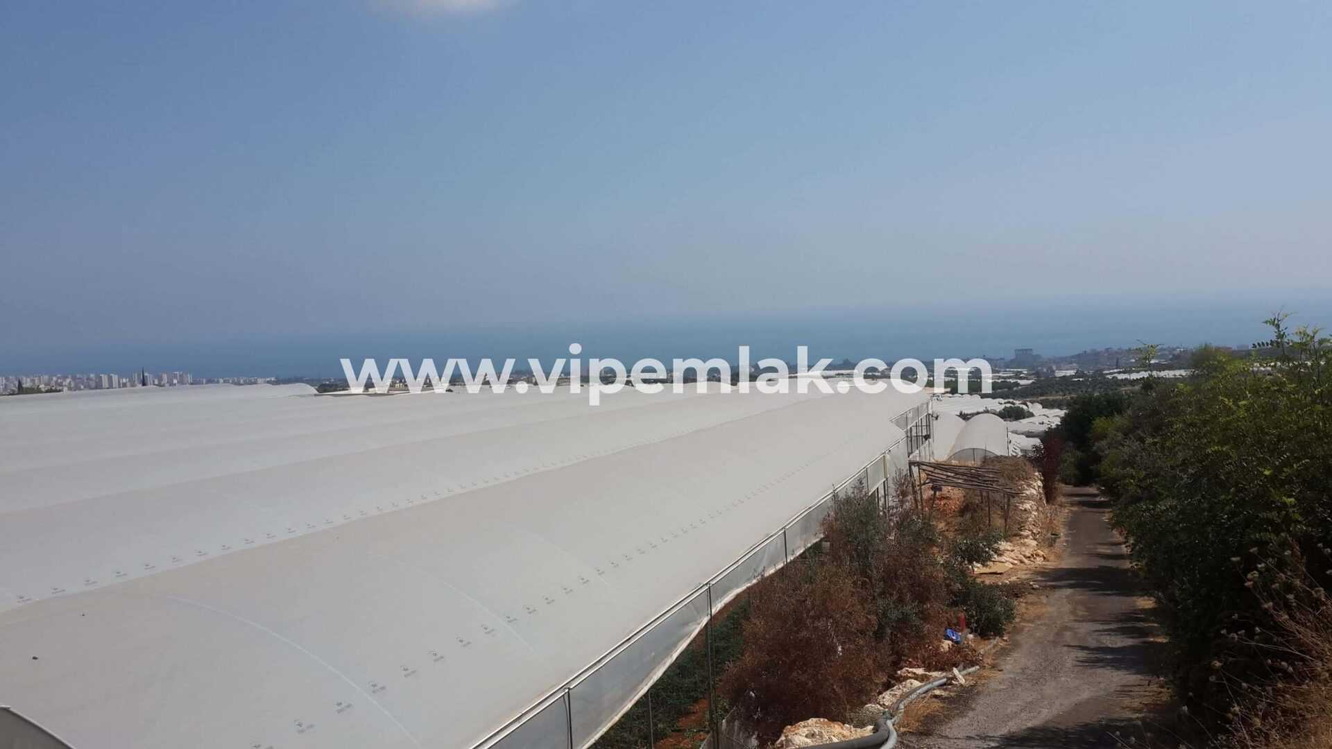 ERDEMLİ SİTE OLMAYA MUSAİT DENİZ MANZARALI SATILIKVİLLALIK ARSA