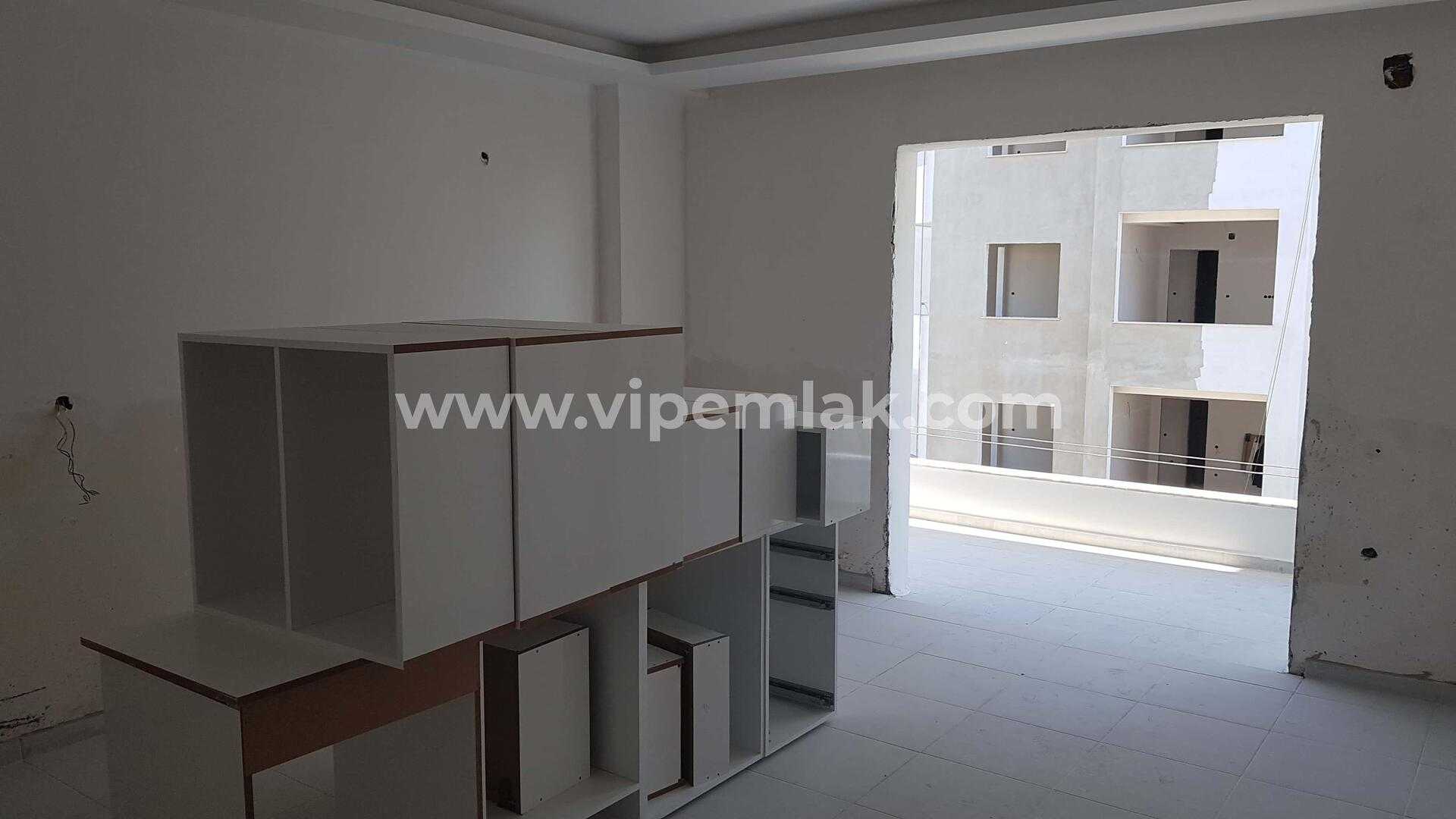 Erdemli sıfır binada satılık uygun fiyatlı 2+1 daire