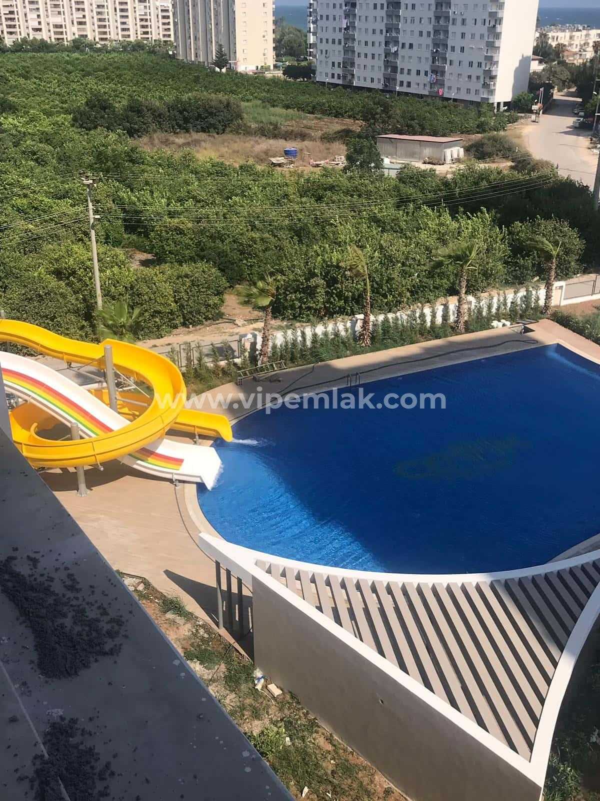 Tece de oturuma hazır havuzlu site içerisinde satılık yazlık daire 4+1