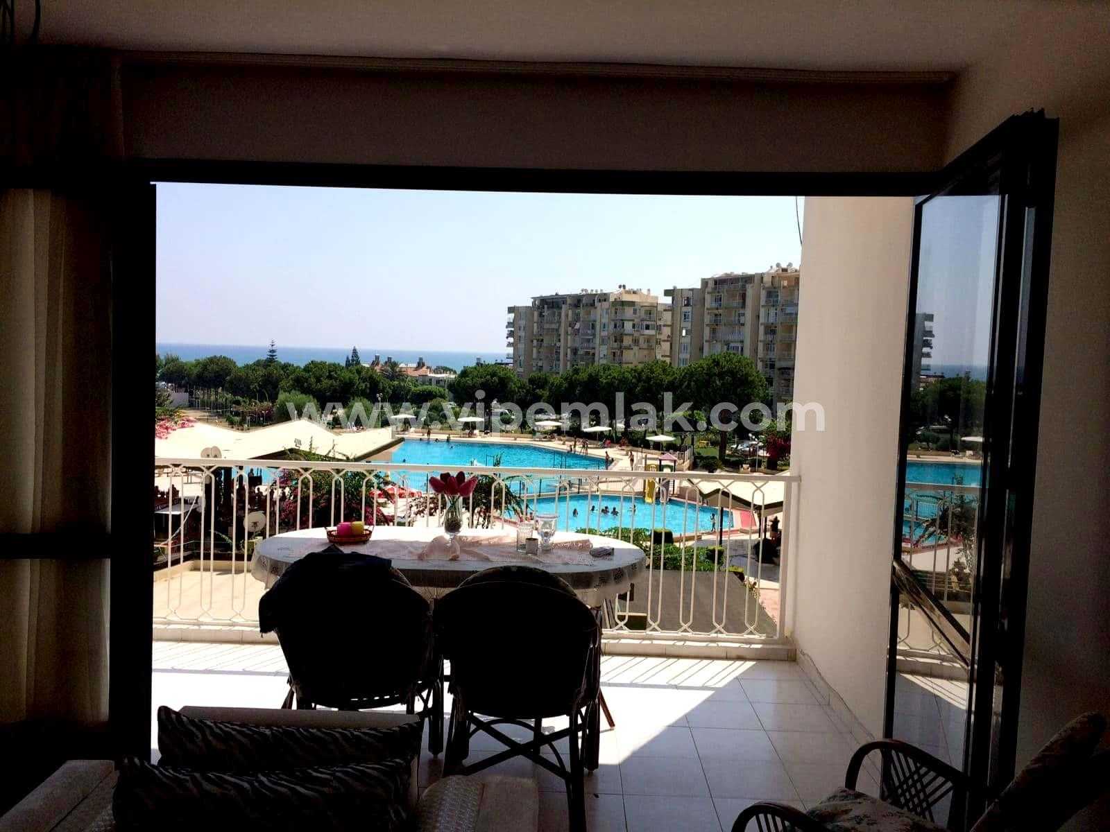 TÖMÜK ÖZALTIN SAHİL SİTESİ DENİZ MANZARALI YAZLIK 2+1 SATILIK DAİRE
