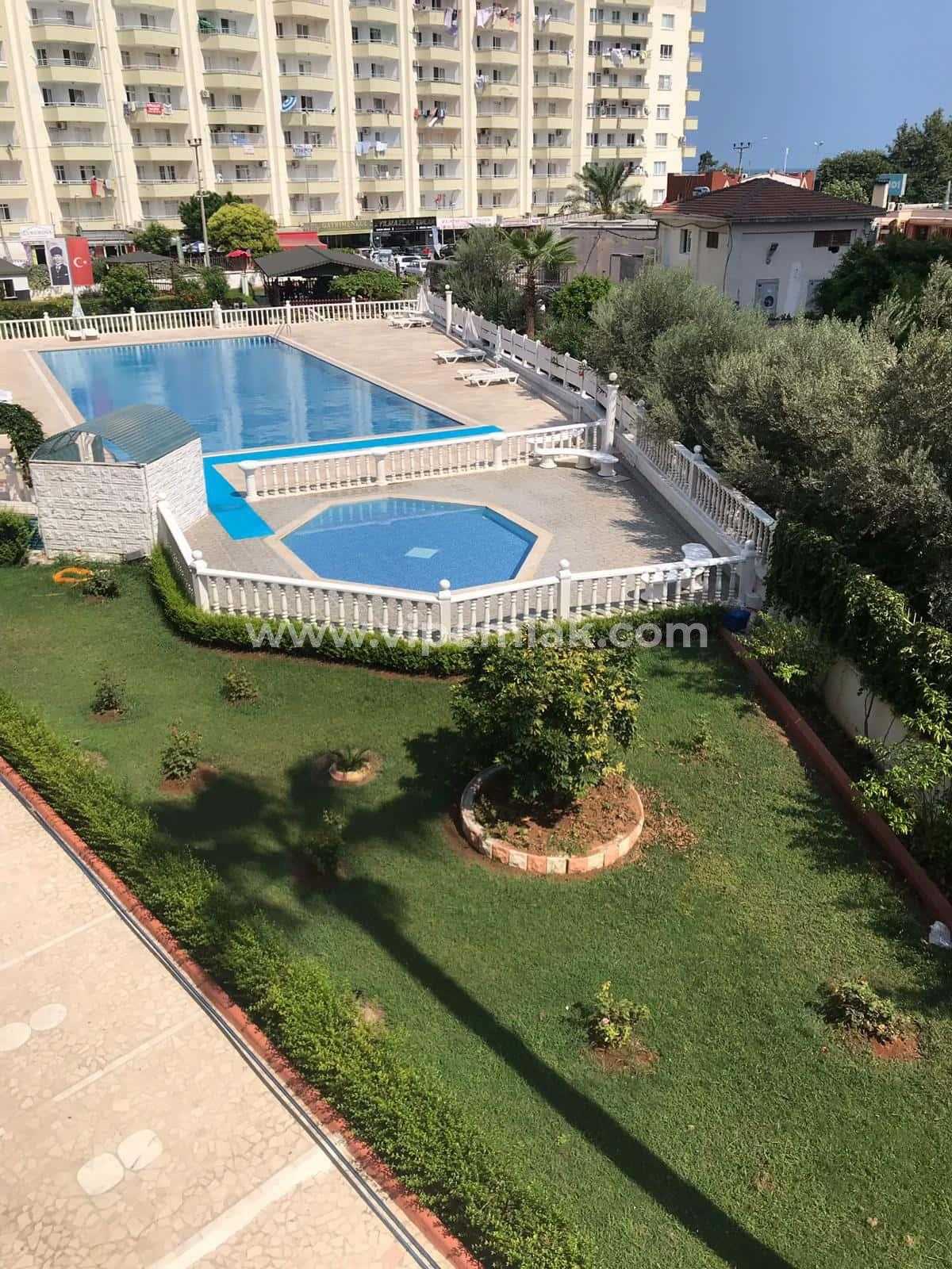 ERDEMLİ TÖMÜK YENİ GÖZDE TATİL SİTESİ 2+1 SATILIK DAİRE