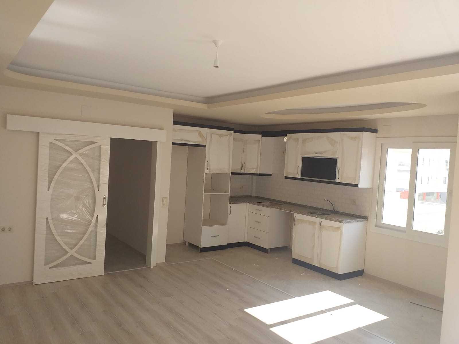 ERDEMLİ HASTANE CADDESİNDE SIFIR 2+1 EŞYASIZ SATILIK DAİRE
