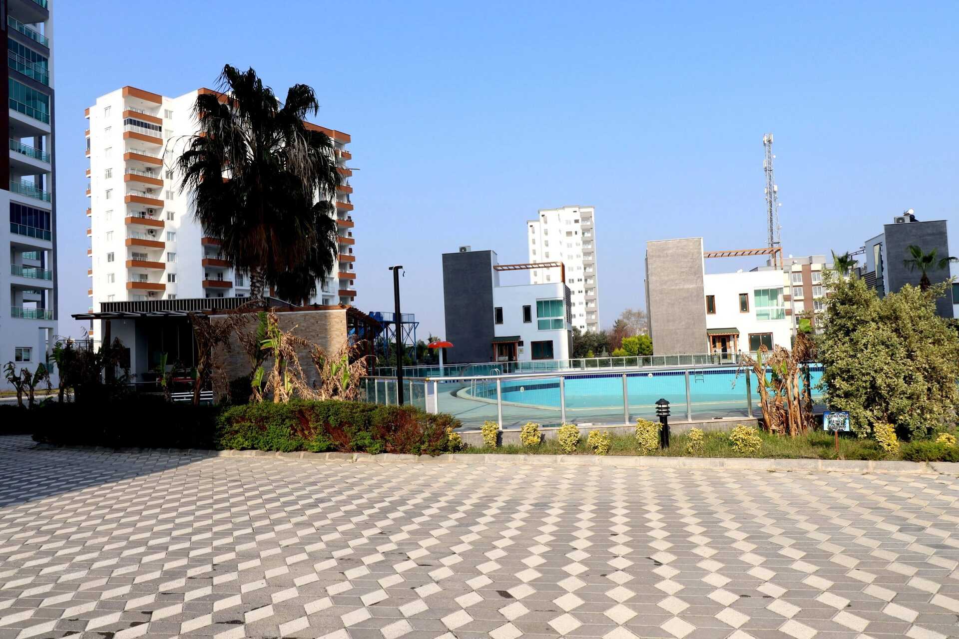ERDEMLİ TÖMÜK ASİS MARMARİS 1+1 EŞYALI SATILIK DAİRE