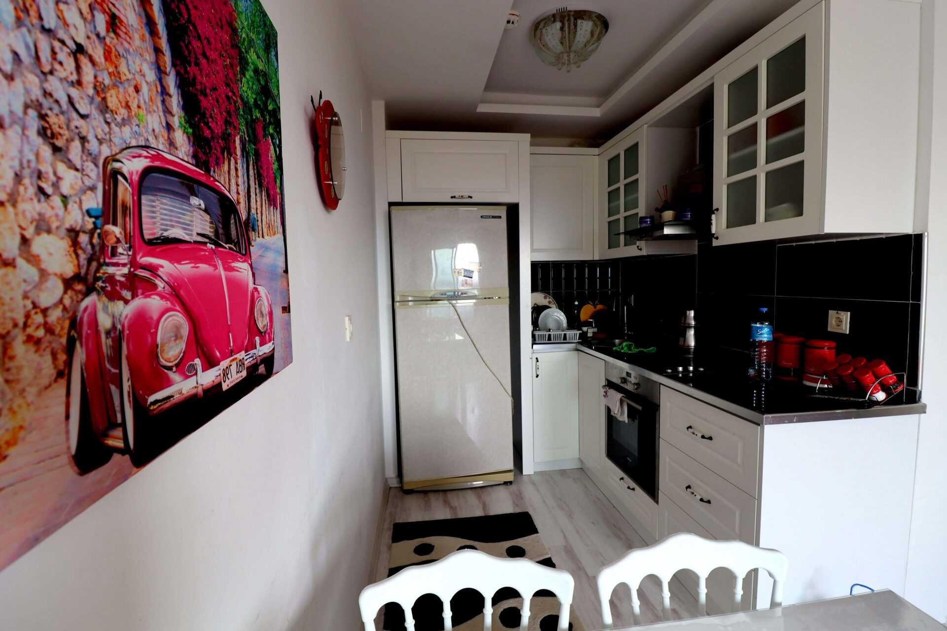 ERDEMLİ TÖMÜK ASİS MARMARİS 1+1 EŞYALI SATILIK DAİRE